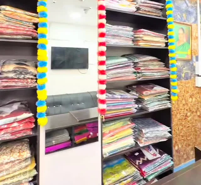 Shelves of sarees and ethnic wear inside the Dress Waves Fashion store in Ambur